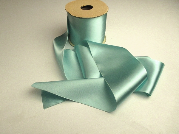 Wide aqua sash ribbon