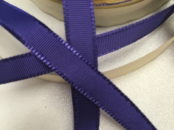 Narrow purple ribbon