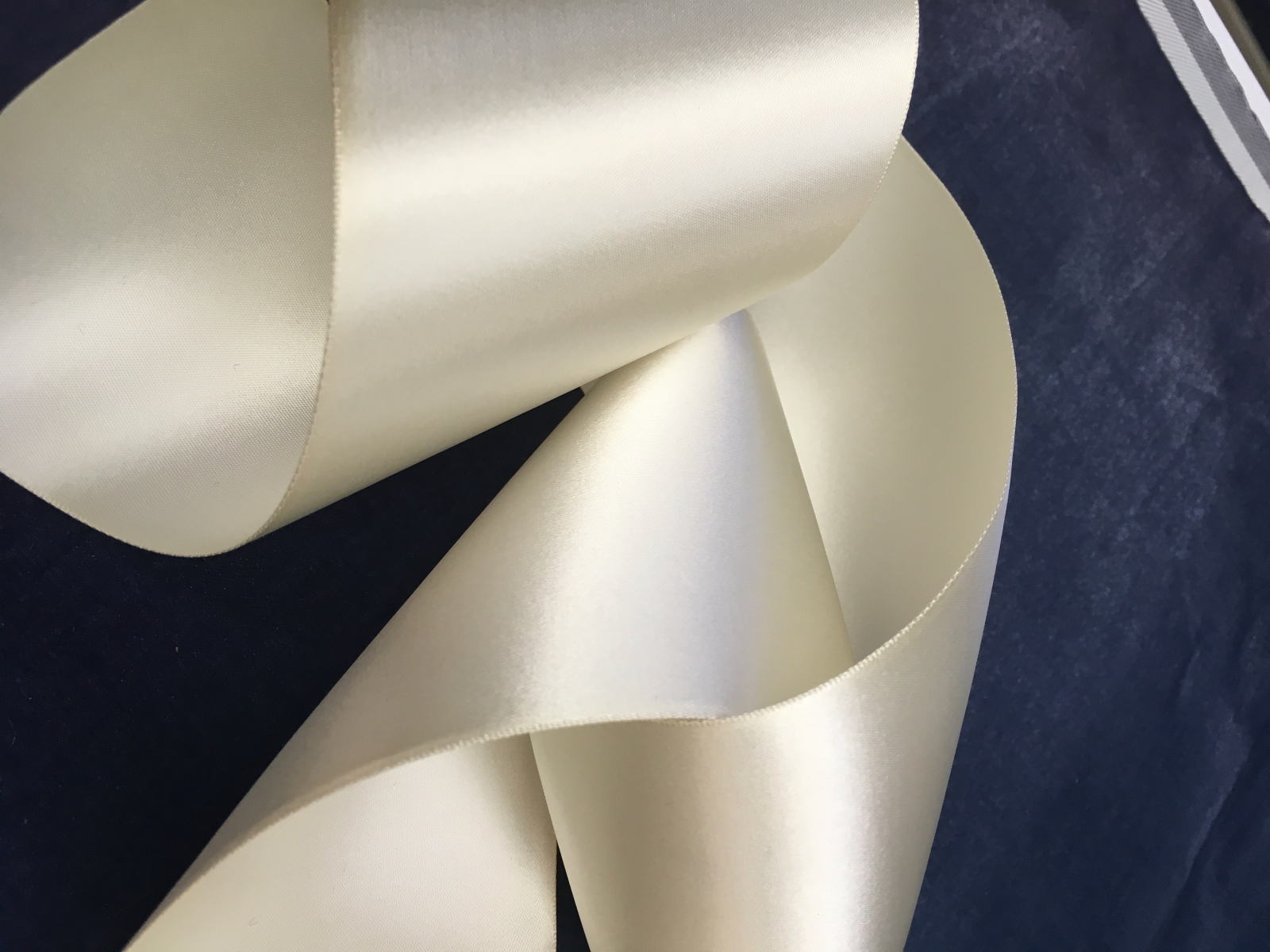 Cream Ribbon in Roll on White Stock Photo - Image of satin